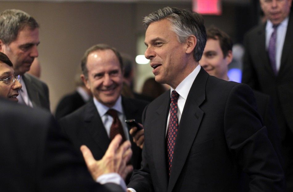 Former Utah Governor Jon Huntsman is greeted after speaking at an event hosted by Thomson Reuters in New York