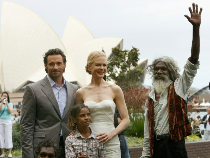 Hugh Jackman, Nicole Kidman and David Dalaithngu (L-R) pose with young co-star Brandon Walters for the film 'Australia' in 2008