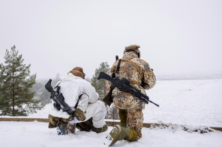 Soldiers take part in the NATO annual military exercise "Winter Shield" 2021 in Adazi, Latvia