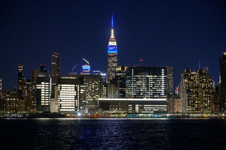 The Empire State Building is illuminated with the colors of the French flag in honor of Josephine Baker