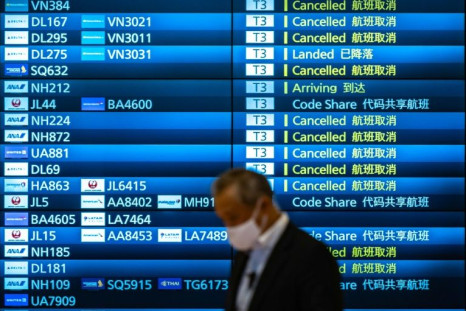 dozens of countries have announced travel restrictions against WHO advice