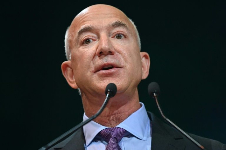 Jeff Bezos, seen during the COP26 UN Climate Change Conference in Glasgow, remains as Amazon's executive chair despite shifting his primary focus to his Blue Origin space company