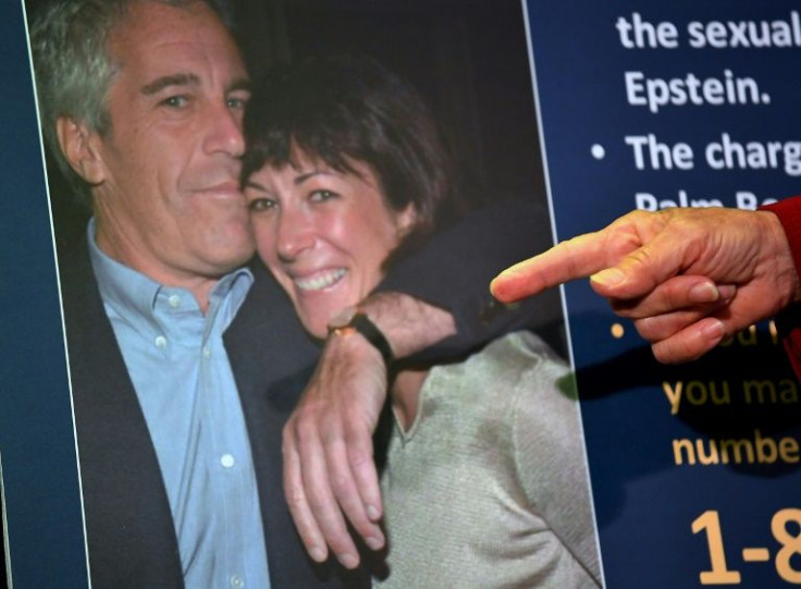 Audrey Strauss, acting US attorney for the Southern District of New York, points to a picture of Ghislaine Maxwell and Jeffrey Epstein