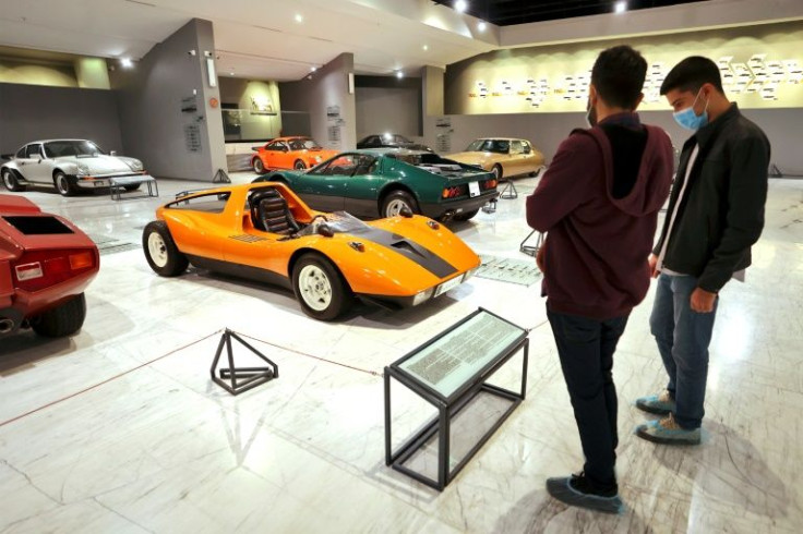 Visitors look at a 1972 MPV automobile by the three famous German car manufactures Mercedes-Benz, Porsche and Volkswagen at the IIran Historical Car Museum