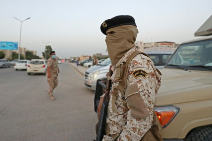Military checkpoints remain a common sight in Libya where persistent clashes between rival militias have raised fears of violence as the country gears up for crux elections