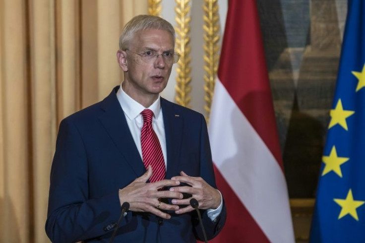 Latvian Prime Minister Krisjanis Karins, visiting Paris, called on NATO to boost its presence its eastern flank in the face of perceived Russian muscle-flexing