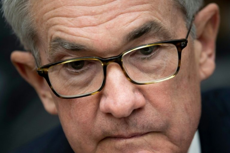 Federal Reserve Board Chair Jerome Powell now sees a risk high inflation will continue for some time, but a central bank survey said there are signs price pressures might be easing