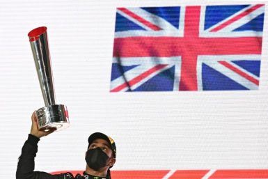 Lewis Hamilton celebrates his victory last time out in Qatar