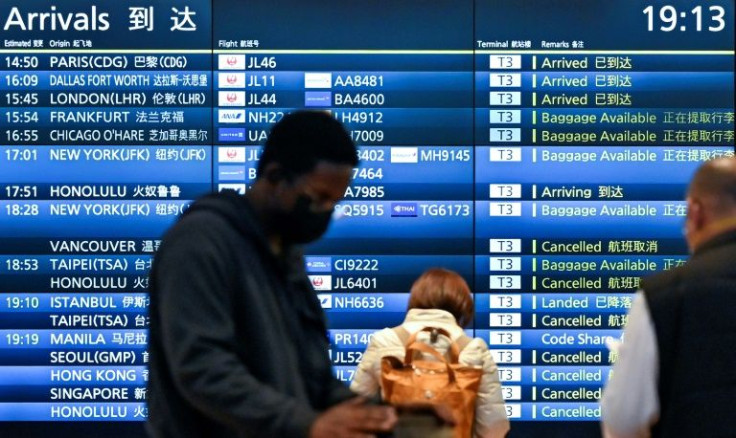 Japan softened a request that airlines halt all new incoming flight bookings so that citizens can return home
