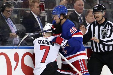 Brendan Lemieux #48 of the New York Rangers pushes Brady Tkachuk #7 of the Ottawa Senators