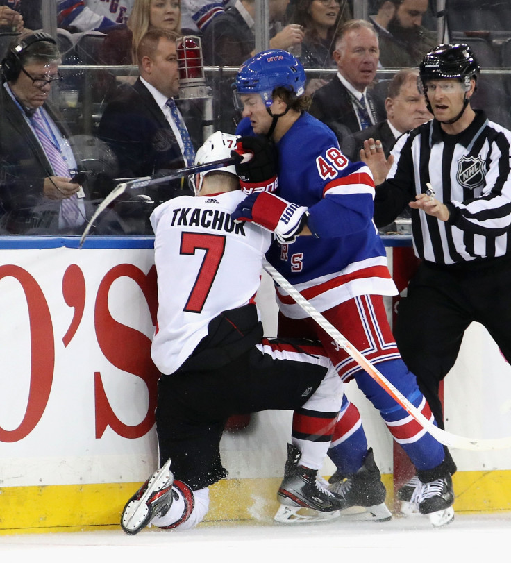 Brendan Lemieux #48 of the New York Rangers pushes Brady Tkachuk #7 of the Ottawa Senators