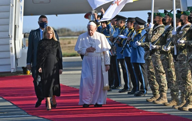 Pope Francis arrives at Larnaca airport in Cyprus at the start of a landmark trip that also takes him to Greece, to push two of his priorities: the plight of migrants and inter-confessional dialogue