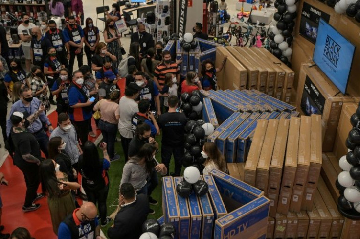 Shoppers buy TV sets at a megastore during a Black Friday sale in Sao Paulo, Brazil, on November 25, 2021