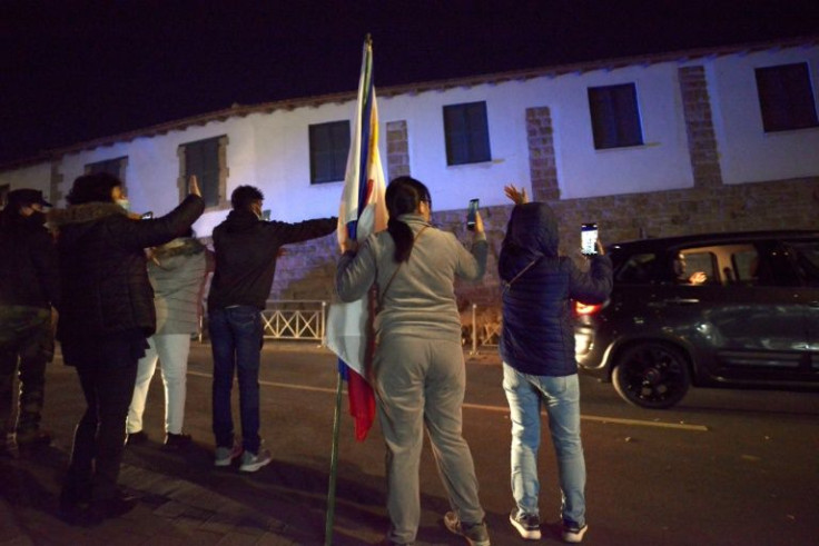 People wave as Pope Francis departs the Maronite Our Lady of Grace Cathedral in Nicosia on December 2, 2021