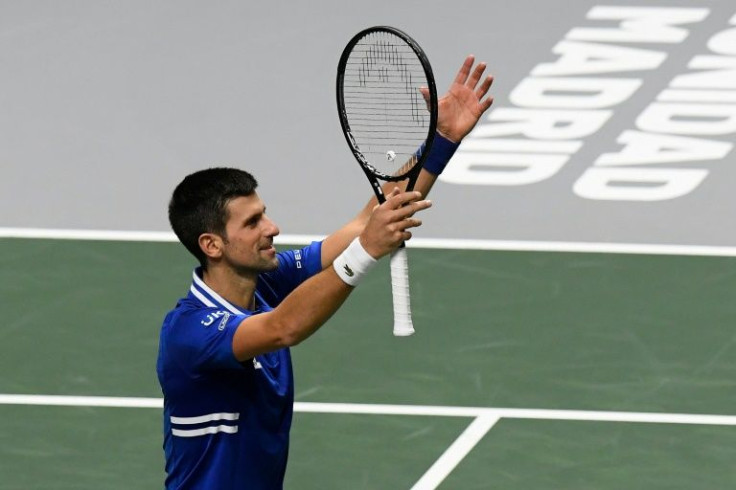 All over: Novak Djokovic celebrates after defeating Marin Cilic