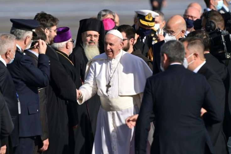Francis is welcomed after arriving in Athens