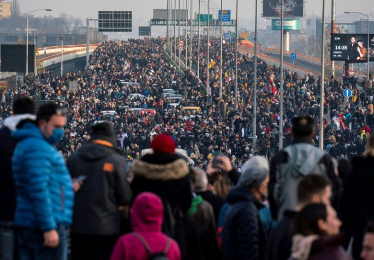 Demonstrators block a highway in Belgrade to protest against Anglo-Australian company Rio Tinto's plan to mine lithium in the country