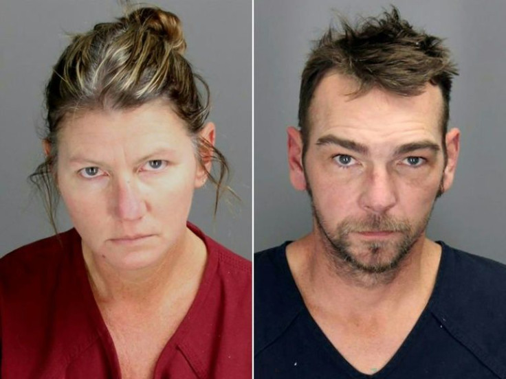 This combination of booking photos obtained from the the Oakland County Sheriff's Office in Michigan on December 4, 2021, shows Jennifer (L) and James Crumbley of Oxford, Michigan