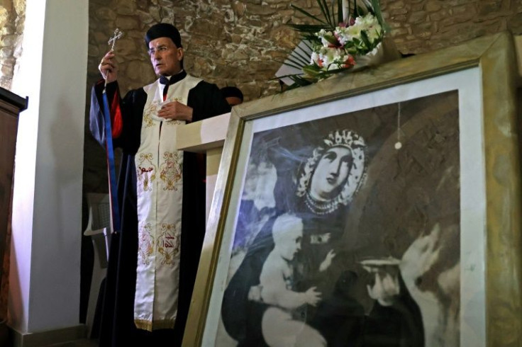 Lebanon's Maronite Patriarch Bechara al-Rahi celebrates mass at Agia Marina church in the Maronite village of the same name -- Maronites first migrated to Cyprus centuries ago from Syria and Lebanon but only about 7,000 Maronites remain on the island
