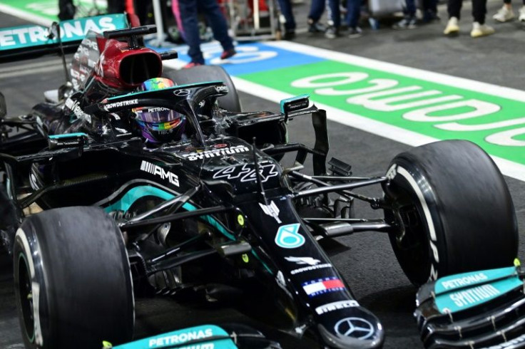 Mercedes' Lewis Hamilton drives in the parc ferme after winning the Saudi Arabian Grand Prix