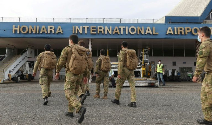 New Zealand Defence Force soldiers arrive in Honiara to join an international peacekeeping mission