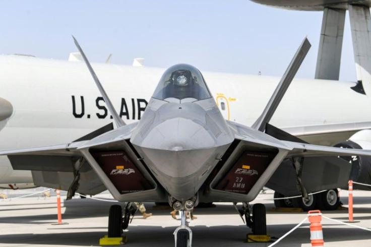 Lockheed Martin, which makes the F-22 Raptor stealth tactical fighter (pictured), consolidated its place as top arms seller with sales of $58.2 billion in 2020