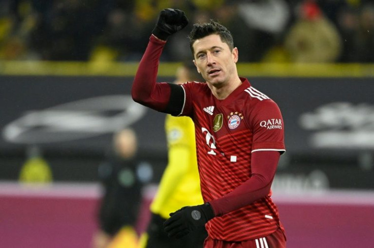 Robert Lewandowski scored twice for Bayern in a 3-2 win at Borussia Dortmund after finishing second to Lionel Messi in the Ballon d'Or voting