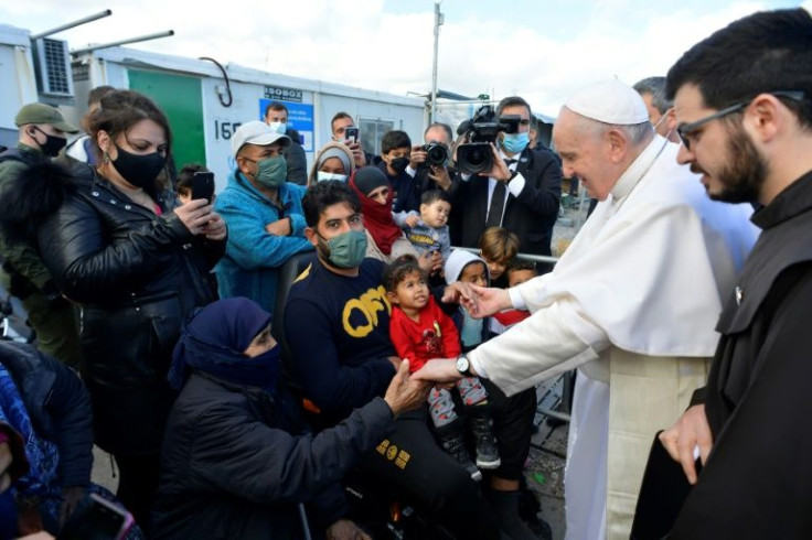 The pope visited migrants at the Mavrovouni camp on the island of Lesbos and told them he was trying to help them
