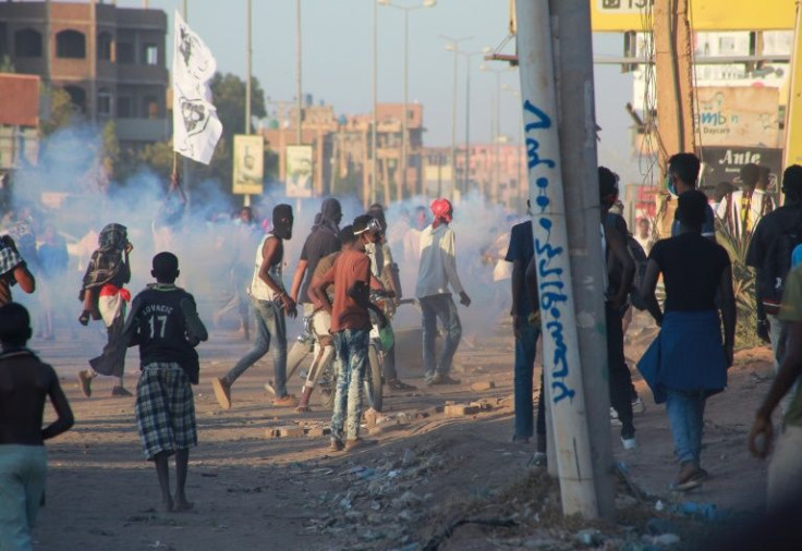 Security forces fired tear gas to try dispersing a rally