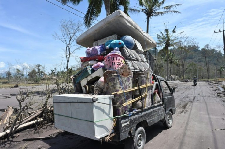 Some tried to salvage their belongings after the destruction unleashed by Semeru