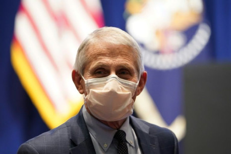 National Institute of Allergy and Infectious Diseases Director Anthony Fauci, pictured on December 2, 2021, at the National Institutes of Health (NIH) in Maryland, told AFP the Omicron Covid-19 variant is possibly milder than the Delta strain
