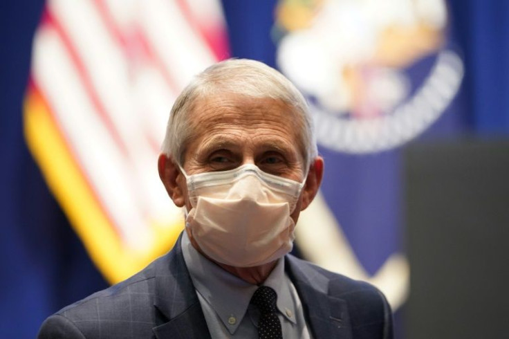 National Institute of Allergy and Infectious Diseases Director Anthony Fauci, pictured on December 2, 2021, at the National Institutes of Health (NIH) in Maryland, told AFP the Omicron Covid-19 variant is possibly milder than the Delta strain