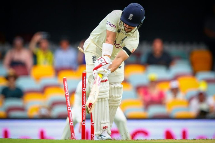 England's Rory Burns is bowled by Australia's Mitchell Starc with the first ball of the 2021/22 Ashes series at the Gabba in Brisbane