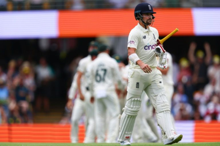 England captain Joe Root trudges off after scoring a duck on the first morning at the Gabba on Wednesday