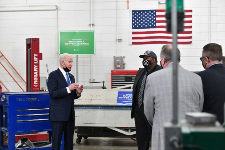 US President Joe Biden speaks as he tours the Kansas City Area Transportation Authority in Missouri