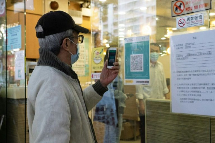 The Hong Kong government has made its coronavirus tracing app mandatory for most adults in 18 types of premises, including bars and restaurants