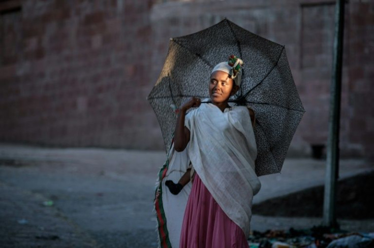 An Ethiopian Orthodox devotee in a street of Lalibela. Residents say they endured four months of deprivation and violence after rebels seized the town