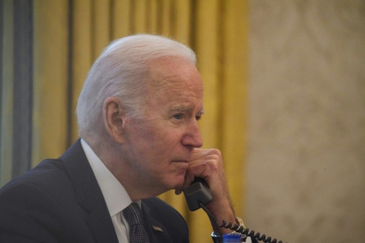 US President Joe Biden speaks on the phone to his Ukrainian counterpart Volodymyr Zelensky in the Oval Office
