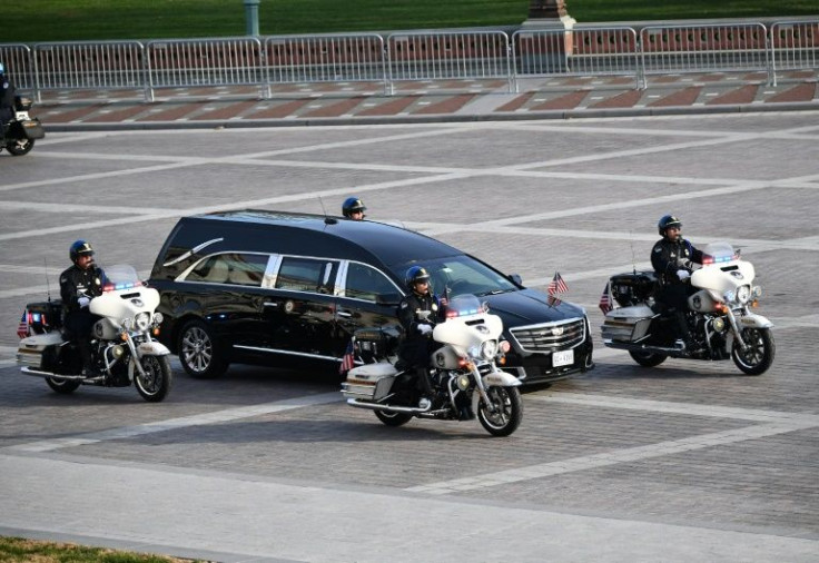 The casket of former US senator Bob Dole arrives at the US Capitol in Washington, DC where it will lie in state on December 9, 2021