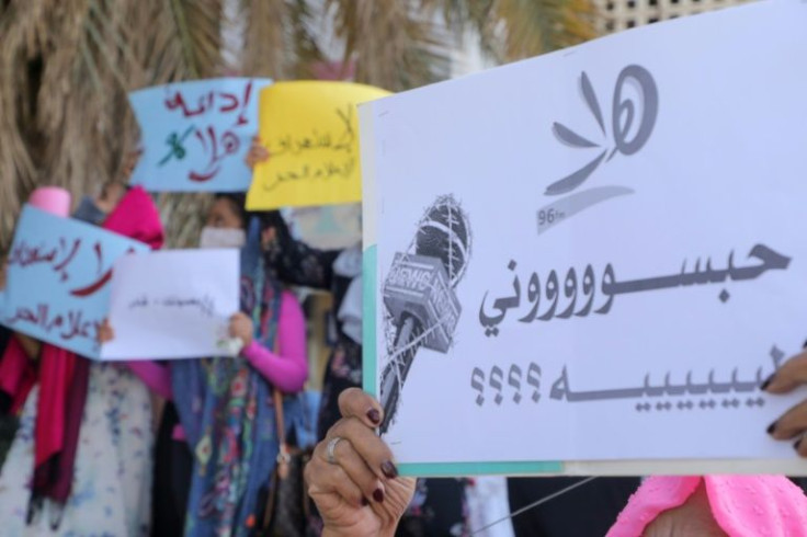 Sudanese journalists rally in front of "Hala 96" radio station's headquarters in the capital Khartoum