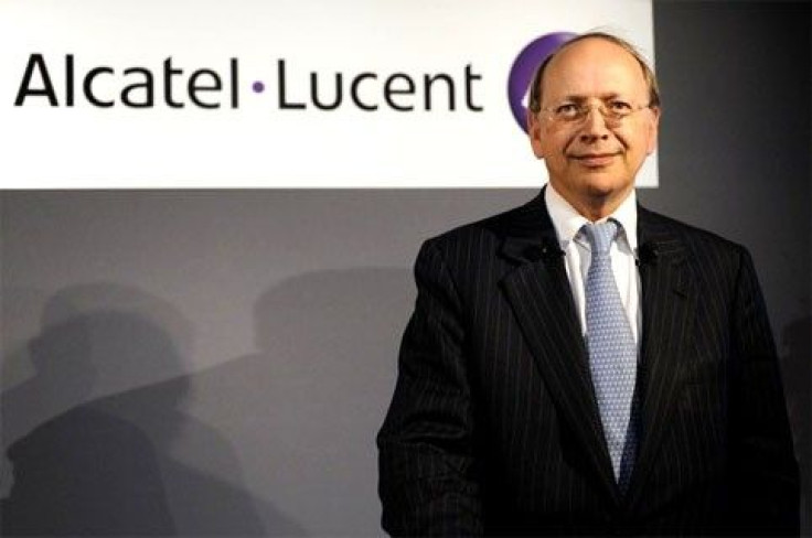 Alcatel-Lucent  Chief Executive Ben Verwaayen poses for photographers