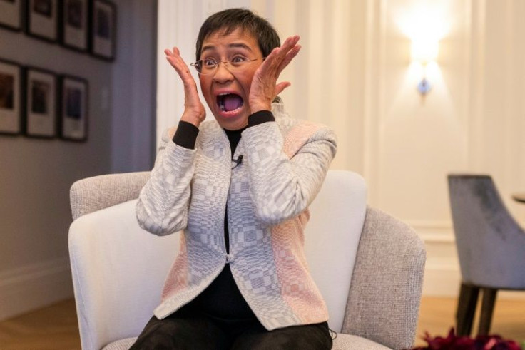 Maria Ressa said she was still stunned to have won the prize, mimicking Edvard Munch's famed painting 'The Scream'