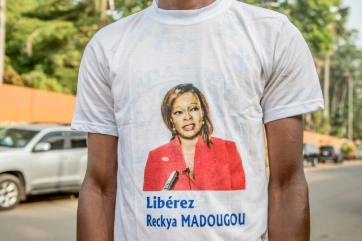 Supporters of Reckya Madougou gather outside the court in Porto-Novo