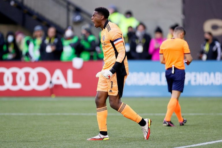 New York City goalkeeper Sean Johnson reacts after one of two penalty shoot-out saves in New York City's MLS Cup win over Portland
