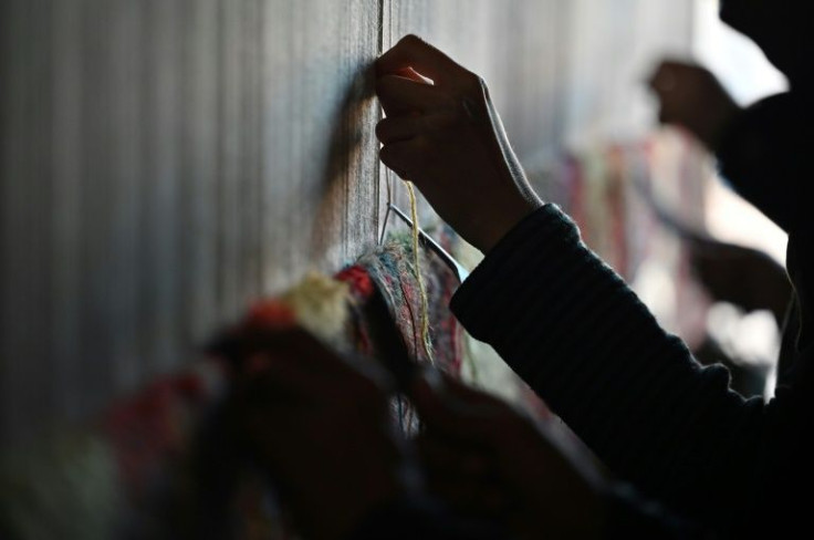 Around two million of Afghanistan's 38 million population work in the carpet sector, according to the head of the national carpet makers' association