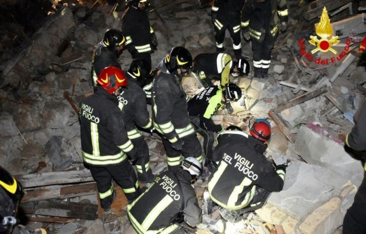 Rescuers search for the rubble for those still missing after the buildings collapsed