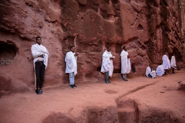 Lalilbela is home to 11 medieval monolithic cave churches hewn into the red rock and is a key pilgrimage site for Ethiopian Christians.
