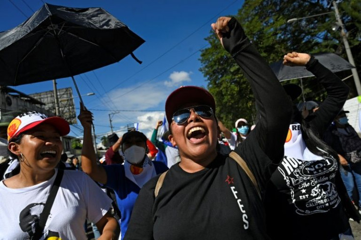 Women shout slogans during a protest against Salvadoran President Nayib Bukele in San Salvador