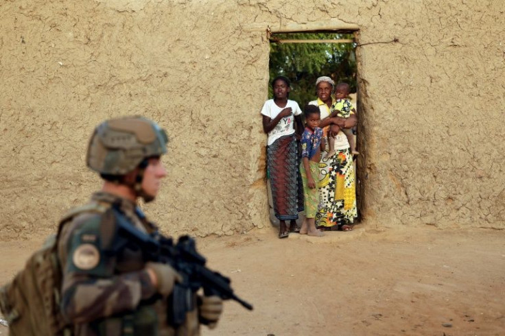 A French soldier patrols the streets of Gao