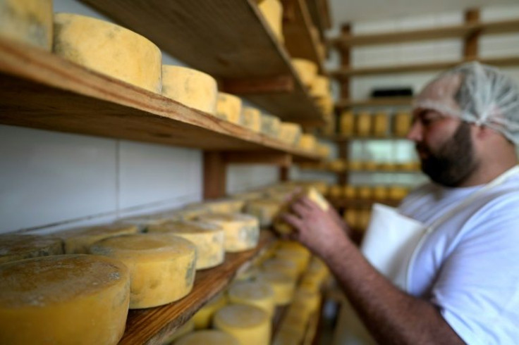 Caik Soares works in the production of Alagoa Fumace cheese in Alagoa, southern region of Minas Gerais, Brazil
